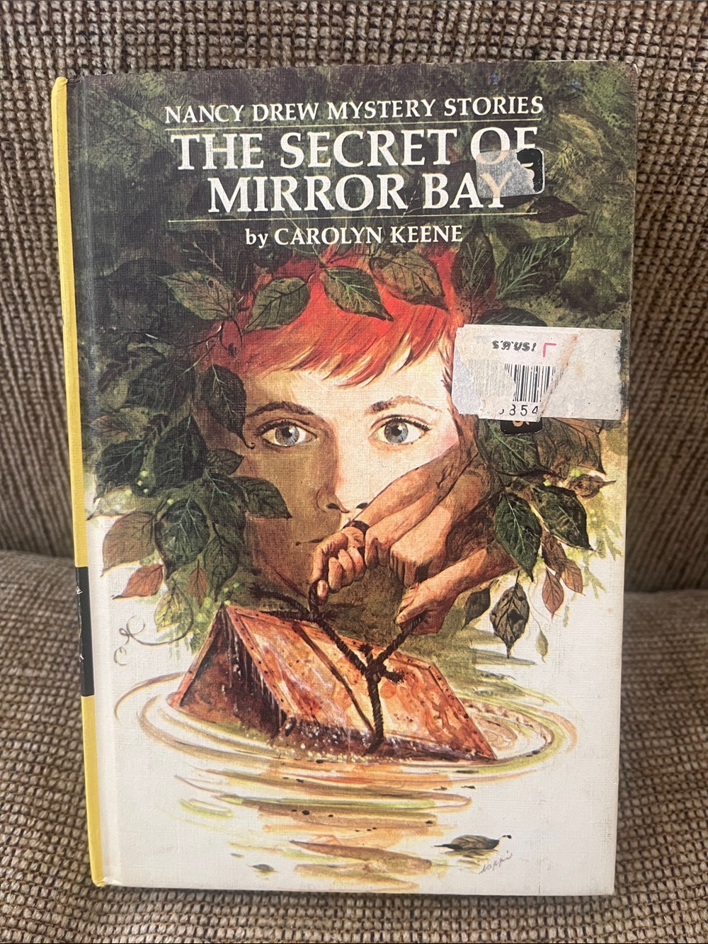 Vintage hardcover copy of The Secret of Mirror Bay by Carolyn Keene